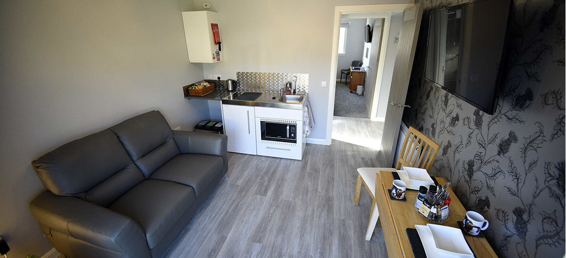 Our self catering apartment suite is open plan design with spacious living room and kitchenette