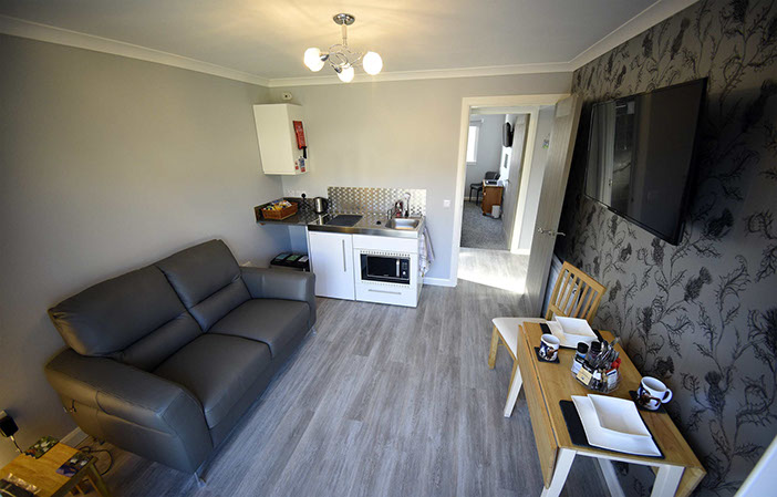 Our self catering apartment suite is open plan design with spacious living room and kitchenette