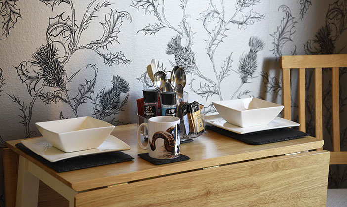 Thistle Dubh Dandy has a private dining table with crockery provided